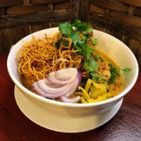 Kao Soi Gai · Northern Thai spicy curry soup with chicken, coconut milk, pickled green mustard, shallots, ...