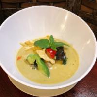 Green Curry · Green curry paste with coconut milk, bamboo shoots, purple eggplant, zucchini, bell pepper a...