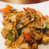 Pad Kee Mao Noodle · Drunken noodle. Stir-fried wide-rice noodle with egg, bamboo shoots, bell pepper, onion, mus...