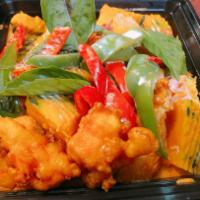 Salmon Pumpkin Curry · Crispy salmon cooked in red curry sauce, pumpkins, bell pepper and basil .