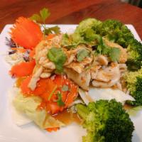 Pad Garlic · Stir-fried garlic with broccoli, cabbage, carrot, then topped with black pepper and crispy g...