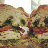 Chicken Pesto Sandwich (grilled) · Sliced chicken breast, parmesan cheese & tomato with house made pesto on a French baguette.