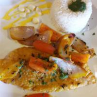 Pescado a lo Chorrillana  · Fried fish filet with the house salad and white rice or topped with an explosion sauteed tom...