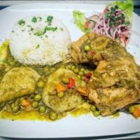 Seco de Pollo  · Peruvian stewed chicken in cilantro sauce with white rice and vegetables. 