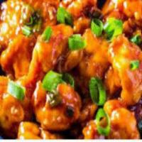 Ghobi Manchurian · Cauliflower fritters fried and tossed in a tangy Chinese sauce with dash of Indian spices.