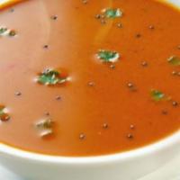 Tomato Soup · Tomato soup with Indian herb spices.