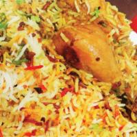 Hyderabadi Chicken Dum Ka Biryani (with bone) · Saffron basmati rice steamed along with chicken (with bones) marinated and cooked in traditi...