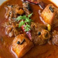 Lamb Curry · Tender lamb marinated and cooked in a curry sauce of fresh Indian herbs and spices.