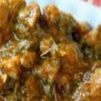 Goat Gongura · Goat with gongura (red sorrel leaves) cooked with special spicy curry sauce.