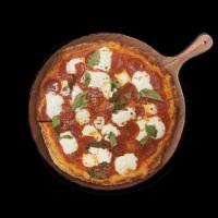Pepperoni Pizzetta · Fresh mozzarella, pomodoro, pepperoni, Parmesan and olive oil.