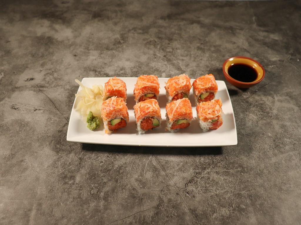 R56. Dynamite Roll · Spicy tuna, avocado inside out with spicy crab and crunchy. Spicy.