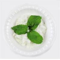 Jajeek · A yogurt and cucumber dip blended with garlic and dill.