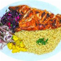 1/2 Grill Chicken · Half chicken slowly cooked over charcoal served with rice and Iraqi salad and onions and bre...