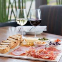 Chauncey Board · Chef's selection of cured meats and artisan cheeses accompanied
by house-made jam and local...