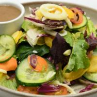 House Chopped Salad · Mixed Greens, Tomato, Hearts of Palm, Cucumber, Carrots, & Balsamic Vinaigrette