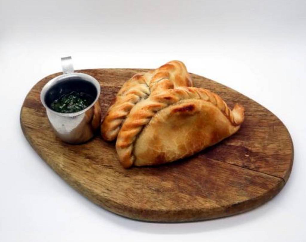 Spicy Beef Empanada · All natural ground beef and onion.