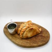 Spicy Beef Empanada · All natural ground beef, onion.