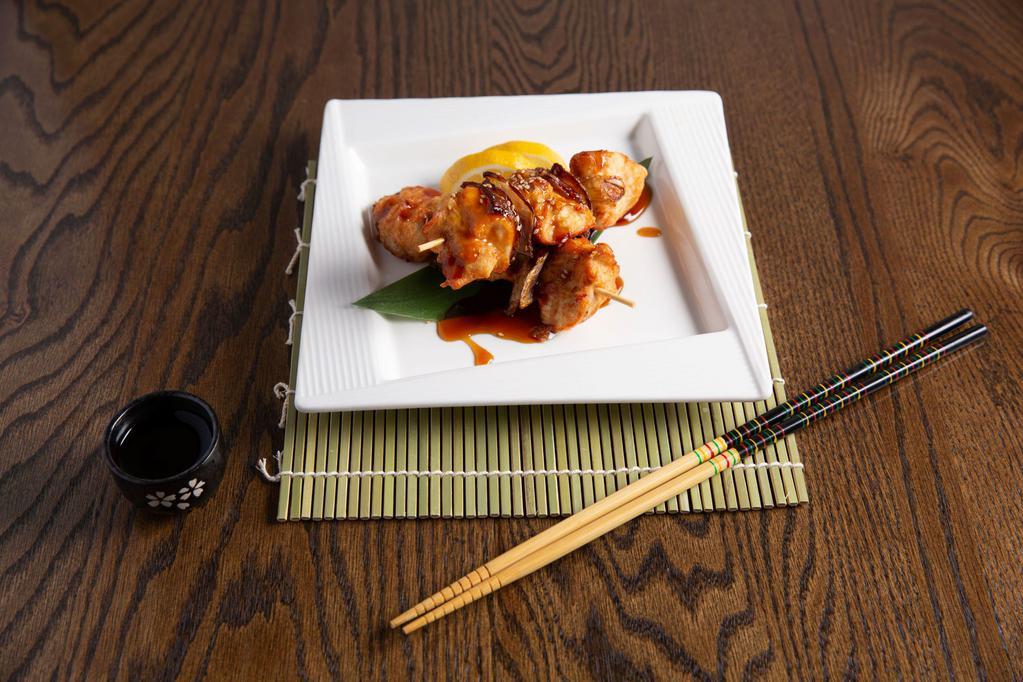 22. Yakitori · 2 skewers grilled skewered chicken and pepper with teriyaki sauce.