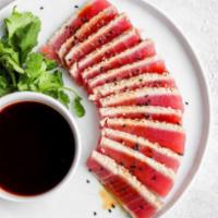 Pepper Tuna Tataki · Sliced Tuna seared, sesame seed with ponzu sauce 