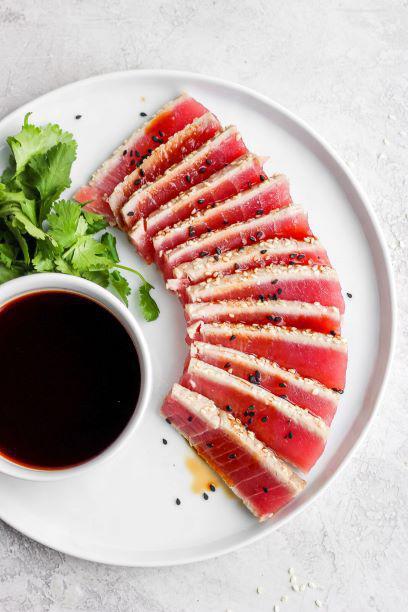 Pepper Tuna Tataki · Sliced Tuna seared, sesame seed with ponzu sauce 
