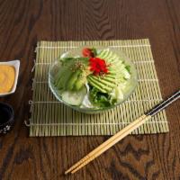 7. Avocado Salad · Avocado on the top, lettuce, small tomato, slice lettuce. with ginger dressing.