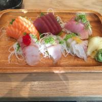 18 Piece Sashimi Deluxe · Chef choice of any 18 piece of sashimi , served with rice on the side. and also the soup and...