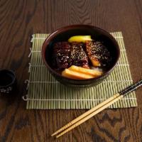 Unagi Don · Eel box. BBQ and eel top of sushi rice,  Served with soup and salad.