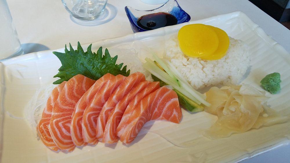 Salmon Don · Sliced Salmon on top of sushi rice. Served with miso  soup or salad.