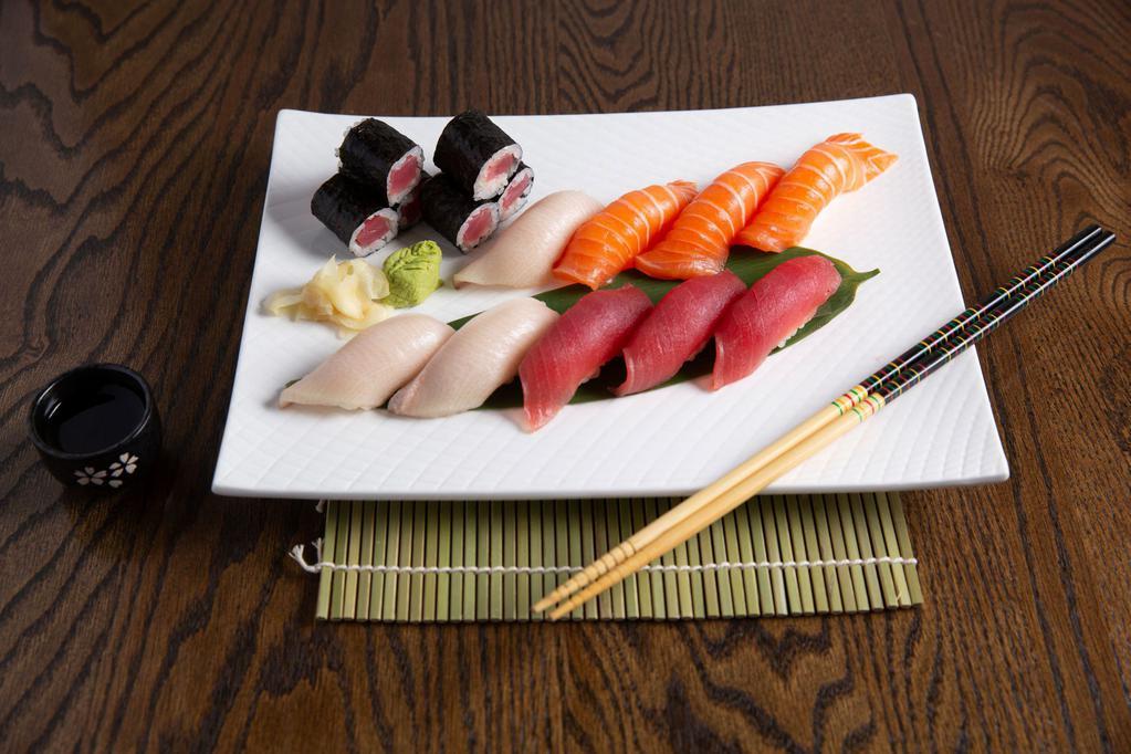 Triple Color Sushi · 3 pcs of tuna, 3 pcs of salmon, 3 pcs of yellow tail. with a choose of salmon tuna or yellowtail roll 