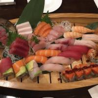 Sushi and Sashimi for 2 · 25 pieces sashimi, 10 pieces sushi, dragon roll and rainbow roll. Served with miso soup or s...