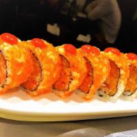 Volcano Roll · 8 pieces. Spicy yellowtail, spicy tuna and spicy salmon inside, tobiko and chili sauce on top.