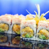 Snow White Roll · White tuna, spicy mayo, avocado, crunchy inside, topped with snow crab and yellow tobiko.