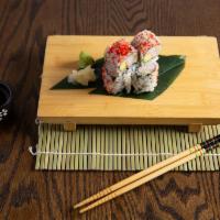 California Roll · Kani, Cucumber, Avocado, rice on the outsidem with tobiko.