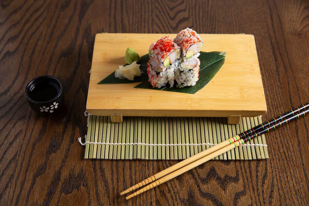 California Roll · Crabmeat, cucumber and avocado. with rice on the outside.