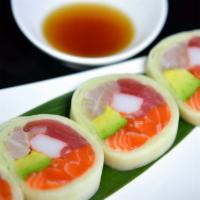 Rainbow Naruto · Wrapped in cucumber. Tuna, salmon, white fish, kani, tobiko, avocado and ponzu sauce.
