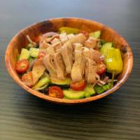 Chef Salad · Lettuce, tomato, black olives, cucumber, pepperoncini, turkey, ham and provolone.