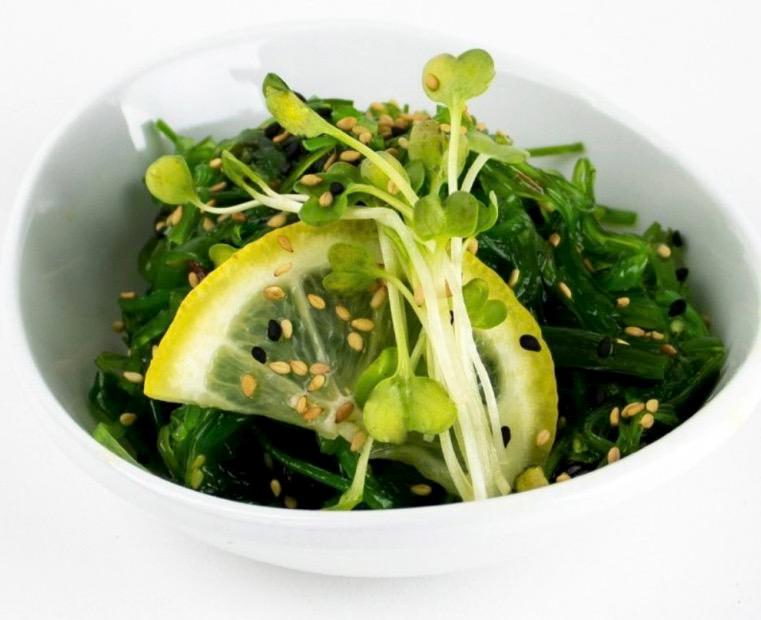 Seaweed Salad · Thin marinated slices of wakame seaweed mixed with seaweed and sesame seeds.
