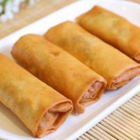 Spring Rolls · 4 pieces of crispy rolled appetizers filled with assorted vegetables.