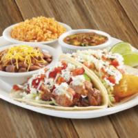 Texas Jack's Taco Platter · 2 tacos with choice of Steak, Chicken or Fish in corn tortillas, with lime crema drizzle and...