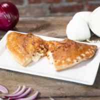 BBQ Chicken Calzone · Fresh roasted chicken, BBQ sauce, onions and hand-grated mozzarella, served with homemade wh...