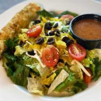 House Salad · Garden fresh mixed greens, pepperoncini, black olives, and grape tomatoes, topped with Parry...