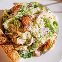 Italian Chopped Salad · Garden fresh mixed greens, fresh mozzarella, tomatoes, salami, pepperoni, marinated artichok...