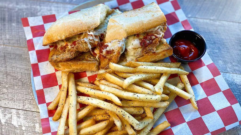 Ad-Rock Chicken Parm Sandwich · Hand-breaded Parmesan chicken covered with homemade marinara, topped with melted hand-grated mozzarella.