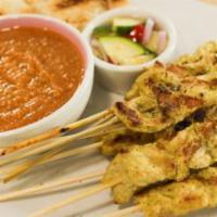 A6. Chicken Satay · 4 pieces. Chicken breast slices marinated in Thai spice and then skewered and grilled. Serve...