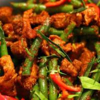 P9. Pad Prik Khing · Stir fried green bean, bell peppers in Prik-Khing chili paste and kaffir leaves.