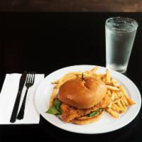 Fish Sandwich · A seasoned white fish filet, hand battered and fried. Topped with lettuce, tomato and our ow...