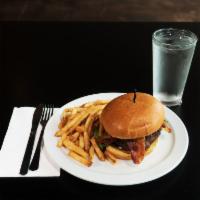 Bacon Cheddar Burger · A homemade ground beef patty, grilled and topped with applewood smoked bacon and cheddar che...
