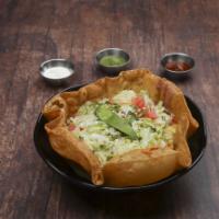 113. Taco Salad · Fried tortilla with rice, beans, lettuce, tomato, onions, sour cream, cheese and choice of m...