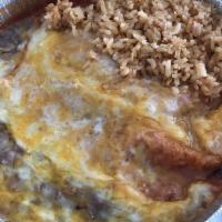 Huevos Rancheros · Egg plate with rice, beans and tortillas.