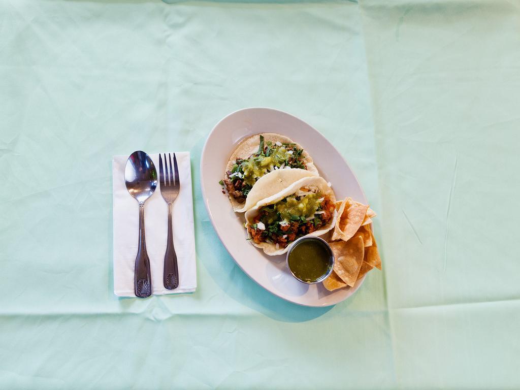 Regular Taco · Your choice of steak, al pastor, grilled chicken, or carnitas, cilantro, onions, and salsa.